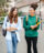 Two young women walking to class